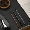 f2247945-fbd5-408b-876a-be96f351346f-high-angle-desktop-essentials-with-laptop.jpg